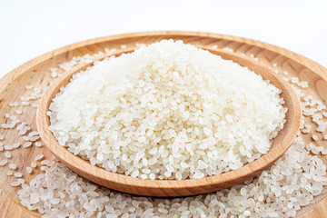 A dish of Chinese northeast rice round rice on a white background