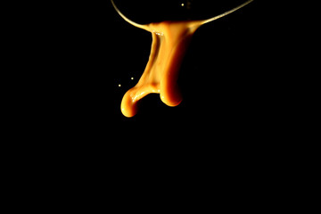 Drink splash on black background