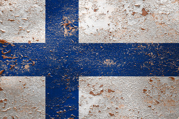 National flag of Finland on old peeling wall background.The concept of national pride and symbol of...