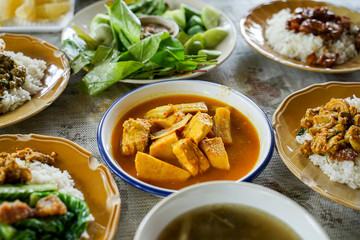 Local Southern Thai Cuisine such as Gaeng Som, Gaeng Sataw, Nam Prik Kapi sale in local markets