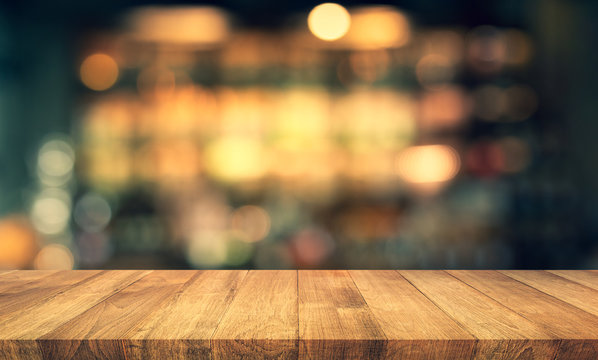 Wood Texture Table Top (counter Bar) With Blur Light Gold Bokeh In Cafe,restaurant Background