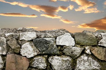 Stone wall and the sunset.