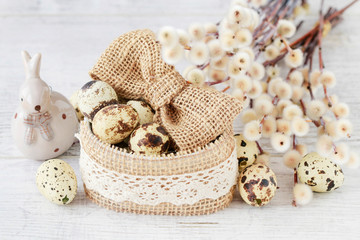 Bowl with quail egg decorated with jute bow. Easter decorations