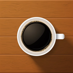 Cup of coffee on wooden background