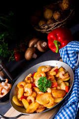 a delicious fried potato and shrimp pan