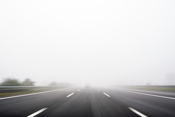 Abstract motion blur road. Black and white colors. Transportation background.
