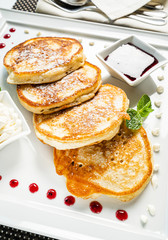 fresh pancakes with sour cream and jam