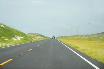 perspective view of road in sand bank
