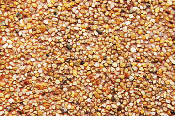 The background of the candle waxed with sand gravel