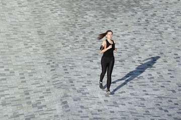 woman running in the city