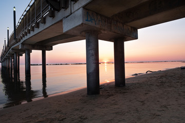 Fototapeta na wymiar Sunrise on the pier .. Francavilla al Mare (ch) Italy