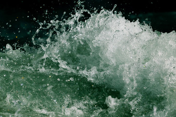 Splashes of water from the waves in the sea
