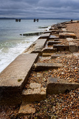 Ruins of the quay for loading landing craft for the historic D-Day landings of World War II (WW2),...