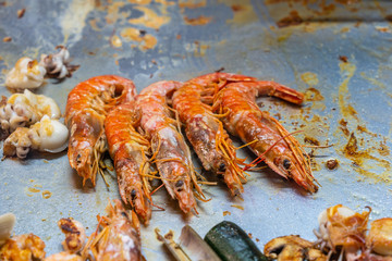 Tasty and delicious prawns on grilling pan in buffet restaurant