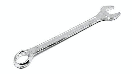 Steel wrench on the white background