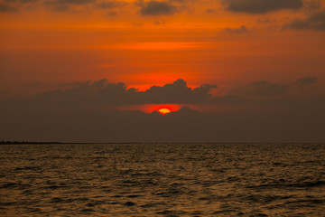 Beautiful sunset and sea wave