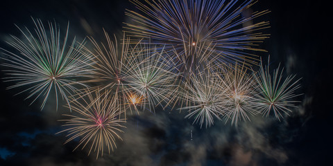 Colorful fireworks close up, fireworks explosion in dark sky. Ventspils city festival. Latvia.