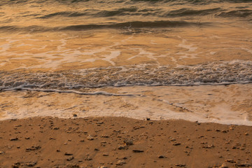 Beautiful sunset and sea wave