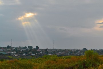 the beam of the sun above the village