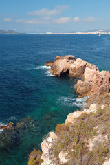 Fototapeta na wymiar Rocky coast and sea gulf. Ibiza, Spain