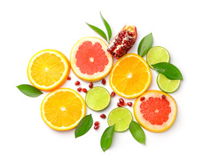 Fototapeta na wymiar Different sliced citrus fruits on white background