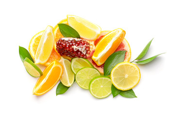 Different sliced citrus fruits on white background