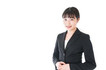 笑顔のスーツを着たビジネスウーマン