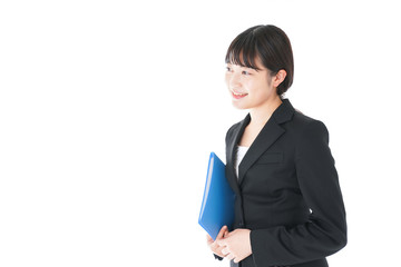 笑顔のスーツを着たビジネスウーマン
