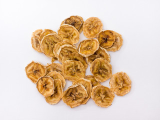 Banana chips on white background. 