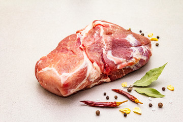Raw fresh pork shoulder with spices