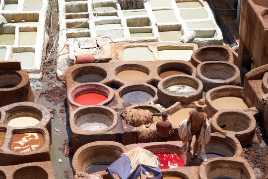 People work at a leather tanneries of Fez in Morocco.