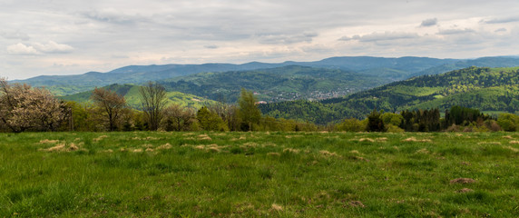 Fototapeta na wymiar Beskid Slaski mountain range panorama from meadow bellow Wielka Czantoria hill on polish-czech borders
