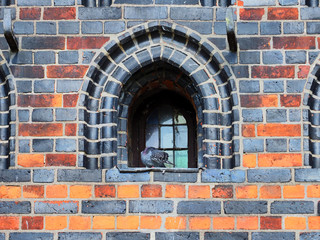 Details of Holsten Gate in Lubeck, Germany. Old town, antique brickwork, windows and decoration