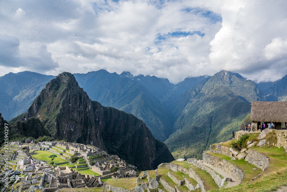 Wall mural machu picchu inca ruins and huyna picchu mountain