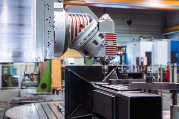 Milling machine robot working on workpiece