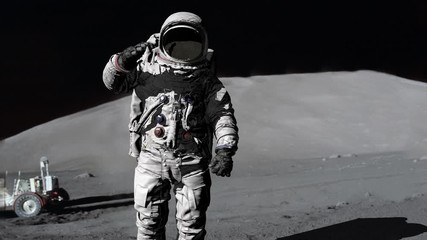 Astronaut saluting. Some Elements of this video furnished by NASA.