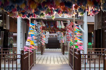 Decorate the house with colorful paper flags used in the rural temple festivals in Thailand.