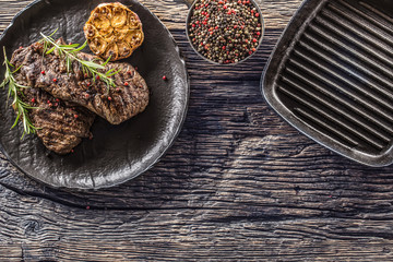 Grilled beef Rib Eye steak with garlic rosemary salt and spices