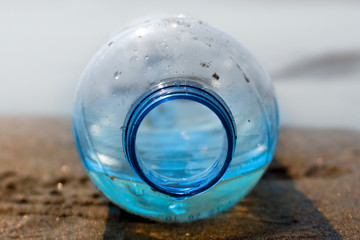 Plastic water bottles pollution in ocean (Environment concept)