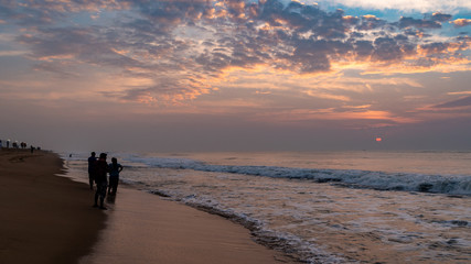 Silhouette People at Puri Beach at the time of Sunrise.