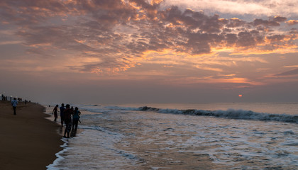 Silhouette People at Puri Beach at the time of Sunrise.