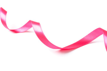 Pink ribbon isolated on white background. Gift concept