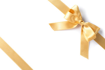 Golden ribbons with bow isolated on white background. Gift concept