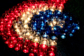 Candle light for the festival in red, blue and white colors