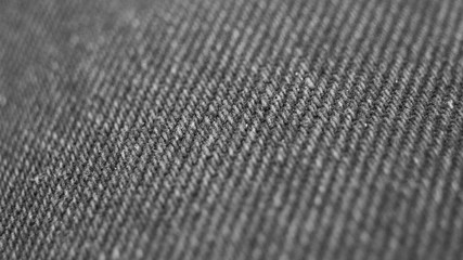 Light grey woolen or tweed fabric for grunge background