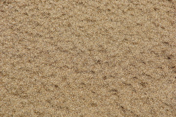 wavy pits tight river sand texture background Golden ochre