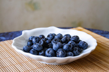 Blueberries on a white plate