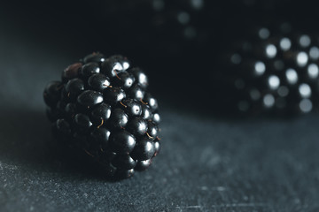 Fresh blackberry on a black background