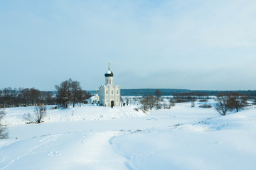 Winter drone shot of Church of the Intercession on the Nerl in Bogolubovo