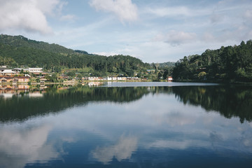 Fototapeta premium Landscape of beautiful lake in the morning at Ban Rak Thai, North of Thailand